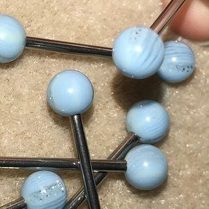 14 Gauge Light Blue, clear and glitter stripes through the design Tongue Ring